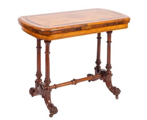 A Victorian walnut and marquetry card table, last quarter 19th century,: the hinged rectangular top with bowed ends, revolvin