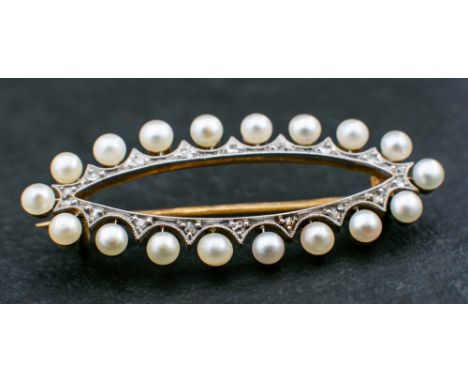 A navette-shaped brooch to cultured pearls and rose-cut diamond surround,: diameter of cultured pearls ca. 2.7mms, stamped '1