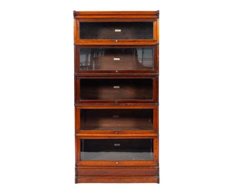 A mahogany and glazed stacking bookcase by Globe-Wernicke Co. Ltd. London, early 20th century,: with moulded cornice above fi