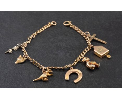 A curb-link charm bracelet and various charms,: the bracelet stamped '9CT', the charms including a kangaroo and a cuckoo cloc