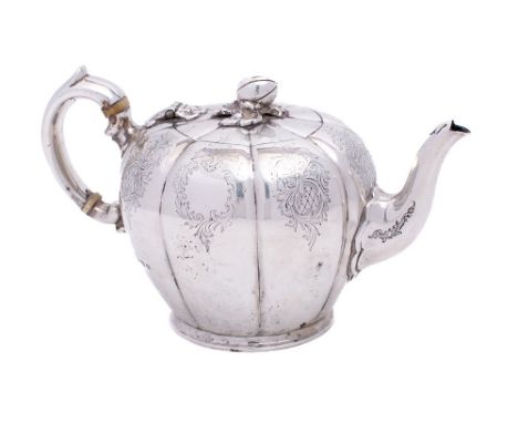 A George V silver teapot, maker Elkington & Co, Birmingham, 1919: of lobed melon-shaped outline, the hinged lid, with melon f