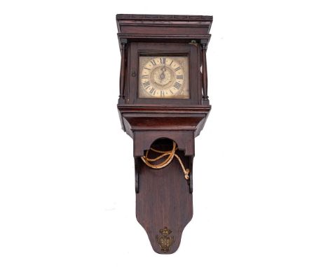 A mid-19th century oak hooded wall clock with alarm: the thirty-hour rope-driven timepiece movement having an anchor escapeme