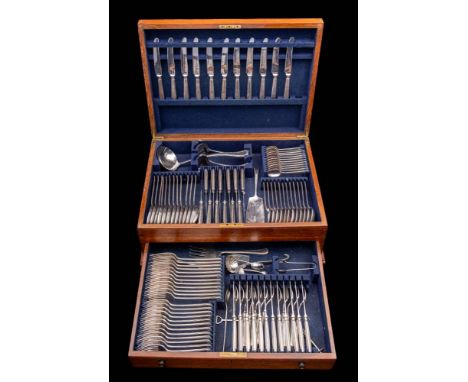 A plated part flatware service: includes twelve table knives, eleven dessert knives, twelve fish knives. twelve fish forks, t