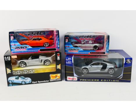 Maisto - Four boxed Maisto diecast model cars in 1:18 & 1:24 scales. Lot includes Maisto 'Pro Modz' 1969 Pontiac Firebird wit