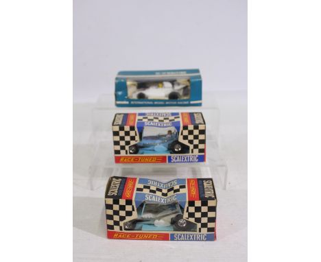 Scalextric - 3 x boxed vintage slot cars, Offenhauser Front Engine car in white # C.79 and in blue # C.79 and a BRM P.160 in 