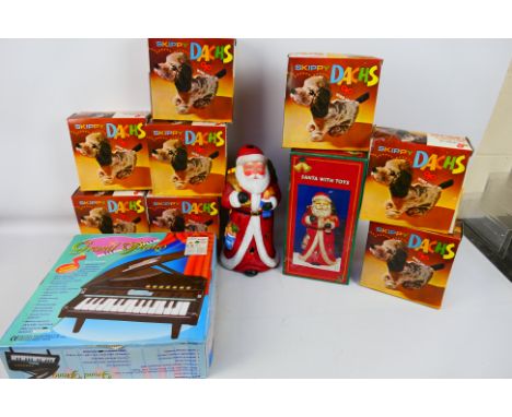 Halsall - Time 4 Toys - Wind-up - A collection of 8 Wind-up Skippy Dachs and a Grand Piano (#2033). Items appear to be in exc