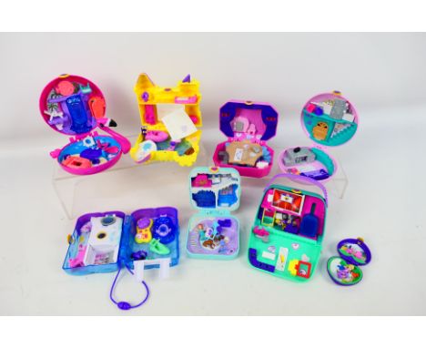 Mattel - Polly Pocket - A collection of 8 Polly Pocket Compact sets including GCJ88 Wolrd Ballet, GDL85 Frosty fairy Tale, GC