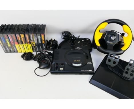 Sega - An unboxed Sega Mega Drive with controller plus Sega Arcade Power Stick, power supply, Logitech Wingman Formula 1 stee