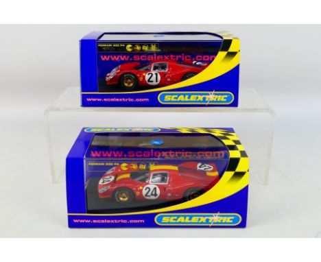 Scalextric - Two boxed Scalextric Ferrari 330 P4 slot cars. Lot consists of Scalextric C2641 Le Mans 1967 RN21 Scarfiotti / P