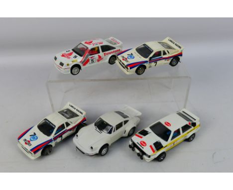 Scalextric - Five unboxed Scalextric slot cars. Lot consists of Scalextric Lancia 037 (x2); Ford Sierra Cosworth; Audi Quattr