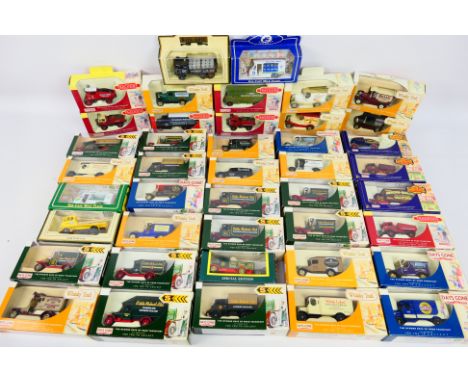 Corgi - Lledo - A collection of approximately 40 Lledo and Corgi Diecast Metal vehicles including #DG043031 Morris Van White 