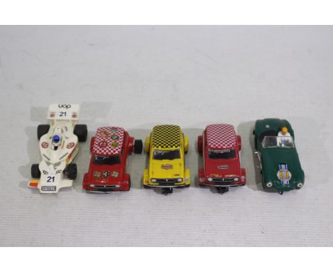 Scalextric - 5 x unboxed vintage slot cars, A.C. Cobra # C.78, Mini Clubman # C.122 x 3 and a Shadow # C.012. They show signs