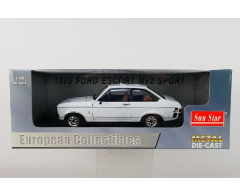 Sun Star - A boxed Sun Star 4612R 1:18 scale 1975 Ford Escort Mk2 Sport. The model in white appears to be in Mint condition, 