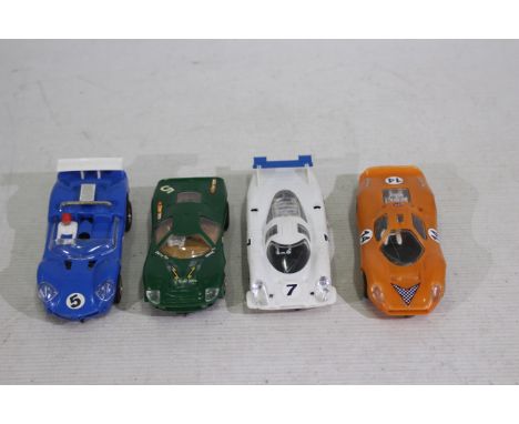 Scalextric - 4 x unboxed vintage slot cars, Porsche 917 # C.22, Mirage Ford # C.15, Javelin # C3-10 and Ford 3L # C.18. They 