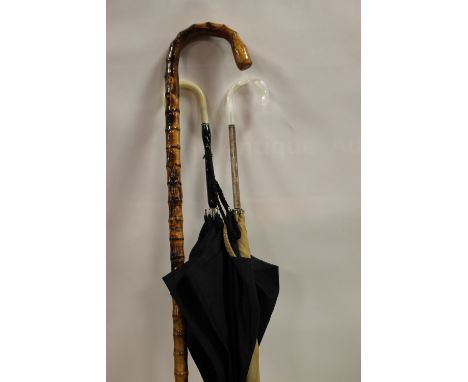 TWO VINTAGE PARASOLS AND A WALKING STICK