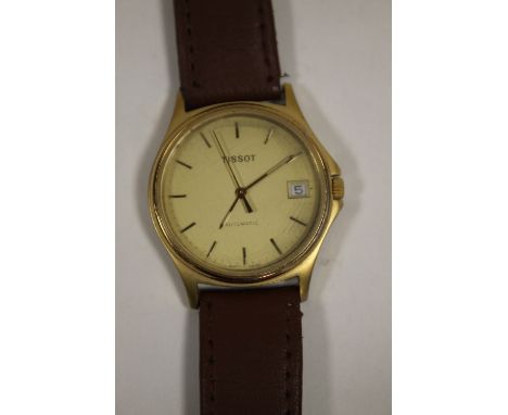 A VINTAGE TISSOT 25 JEWEL AUTOMATIC WRIST WATCH