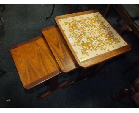 A RETRO G-PLAN TILE TOPPED NEST OF TABLES