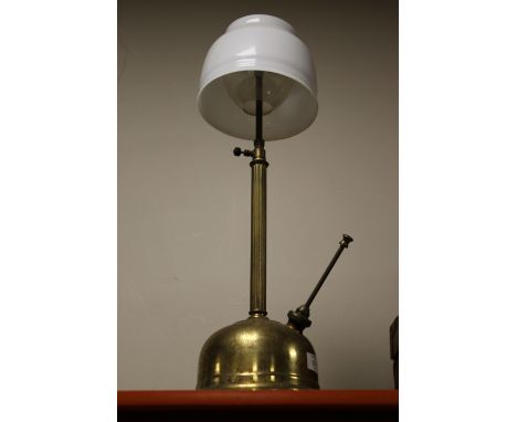A VINTAGE BRASS OIL LAMP AND SHADE