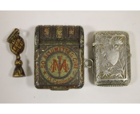 AN ANTIQUE PIPE TAMPER AND A VESTA CASE