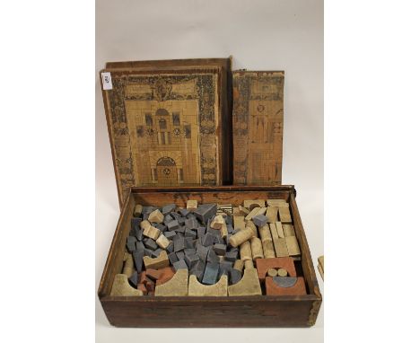 AN UNUSUAL VINTAGE STONE MODEL BUILDING BLOCK SET 