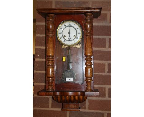 A REPRODUCTION WALL CLOCK