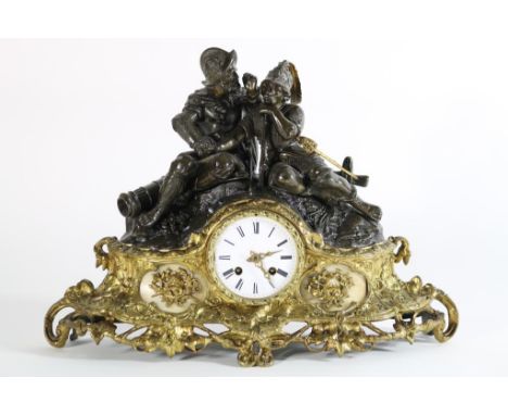   Pendule in zamak kast met emaille wijzerplaat en bekroond met  soldaten, Frankrijk eind 19e eeuw, h. 34 cm.        Pendulum