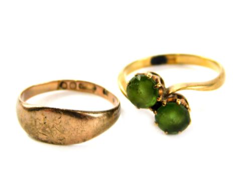 Two dress rings, comprising a 9ct gold signet ring, of rubbed design, ring size G½, and a stone set ring with green semi prec