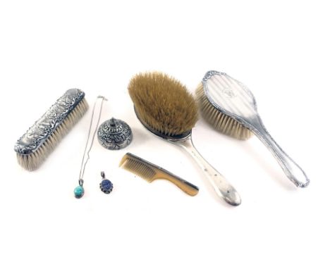 A silver backed part dressing table set, comprising a Phil Packham design hand brush, additional brush, cover, comb, etc., Ge