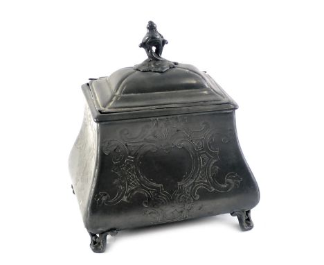 A 19thC pewter tea caddy, of sarcophagus shaped form with bracket feet, 17cm high, 13cm wide, 11cm deep. 