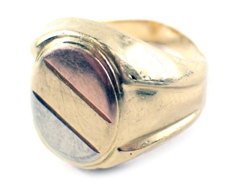 A signet ring, with oval shield and bicolour design with rose gold, silver and gold panelling, with ribbed shoulders, yellow 