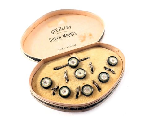 A set of Art Deco gentleman's collar studs, in presentation case, set with mother of pearl and paste stones, in white metal s