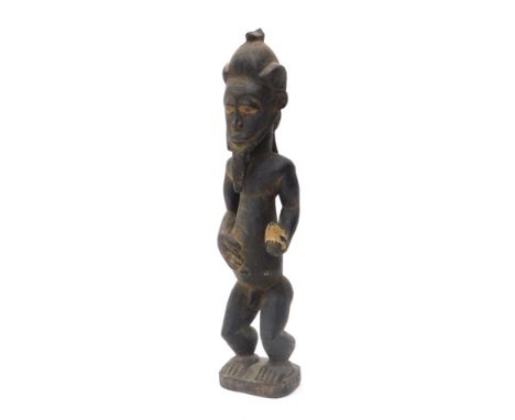 A Baule portrait figure (prosperous) Cote D'Ivoire, approx 75 years old, 51cm high. 