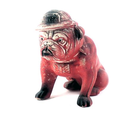 A ceramic painted bulldog figure, painted on red with WWII army hat, inscribed Where's Hitler?, 16cm high. 
