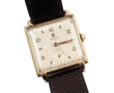 A late 1940s Rolex gent's wristwatch, with square watch head and a white interface with seconds dial and gold hands, numbered