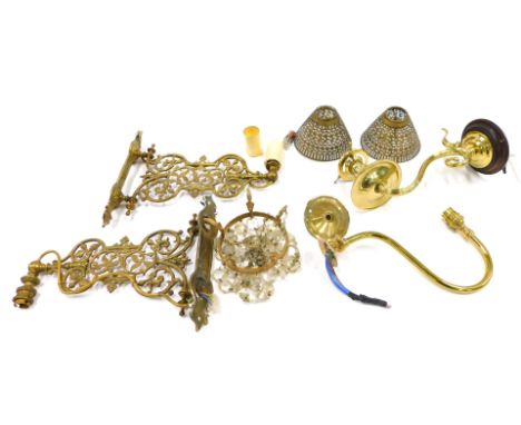 A pair of Arts and Crafts style brass wall lights, each cast with flowers and leaves, a small basket light fitting, pair of p
