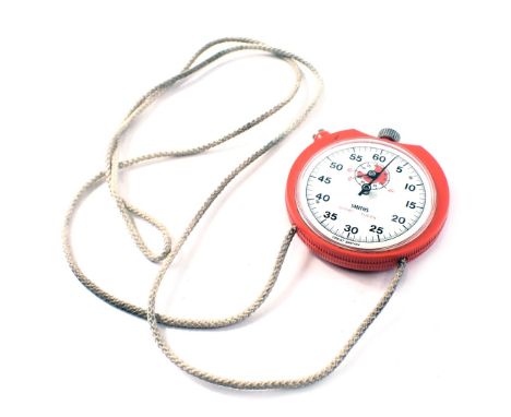 A Smiths Sport Timer pocket watch, in an orange plastic casing, on string. 