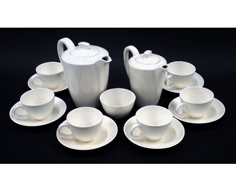 A Poole pottery white finish tea and coffee set, comprising teapot, coffee pot, seven cups and six saucers. 