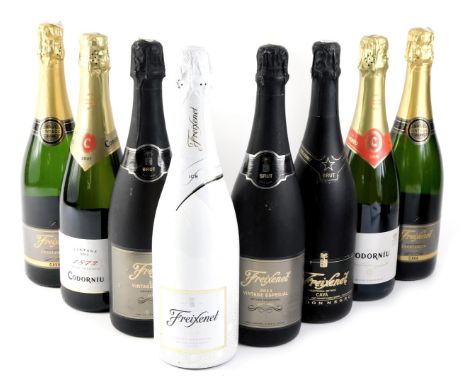 Eight bottles of mixed sparkling wine, to include Freixenet 2011 vintage especial.