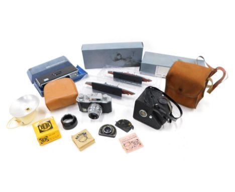 A Halina camera, two model ships, etc. 