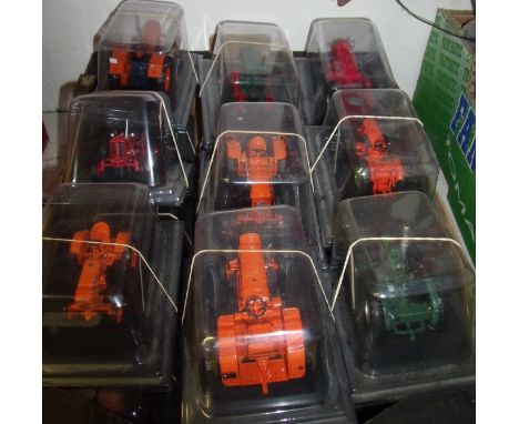 Eighteen cased scale model collectors vintage tractor models