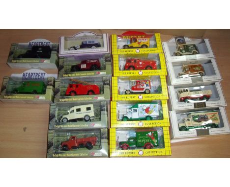 Selection of die cast vehicles including Rupert Bear Collection, Heartbeat Collection, North Yorkshire Moors Railway Collecti