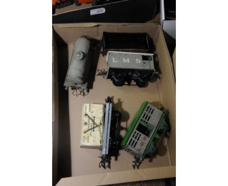 Selection of O gauge Hornby Meccano tin plate wagons including Poole tanker, LMS plank wagon, LMS cattle truck etc.