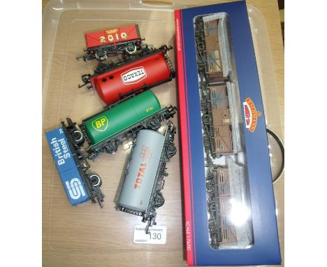 Bachmann triple pack of 8 ton cattle wagons BR Bauxite Weathered (37-716), three Hornby OO gauge tankers and two Hornby OO ga