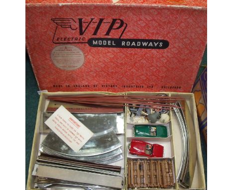 VIP Electric Model Railways Set A comprising figure 8 race track, two 1.32 scale model cars, remote controllers, fencing etc.