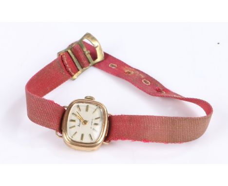 Accurist ladies 9 carat gold wristwatch, the signed silver dial with baton markers, manual wound, the caseback with presentat