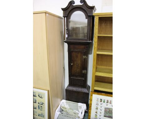 J. Nicholas of Daventry oak longcase clock, the broken arch pediment above an arched glazed door, the painted dial with Roman