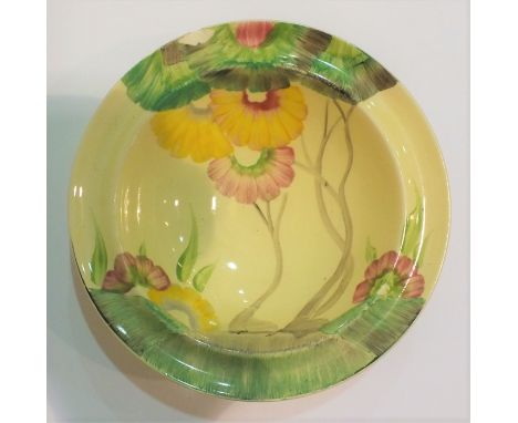 Clarice Cliff Rhodanthe pattern shallow bowl, with green, red, yellow and brown foliate decoration, printed mark to base, 16c