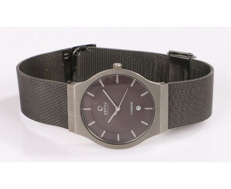 Obaku Titanium gentleman's wristwatch, the signed grey dial with baton markers and date aperture at the six o'clock position,