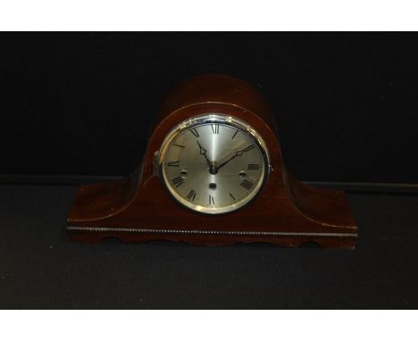 Mahogany cased Napoleon hat mantel clock, the silvered dial with Roman numerals, 43cm wide