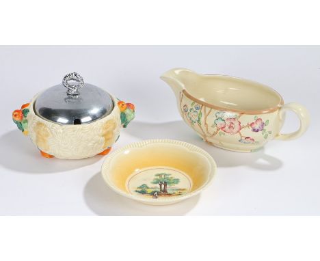 Clarice Cliff Celtic Harvest preserve pot with plated cover and raised wheat sheaf and fruit decoration, sauceboat with folia
